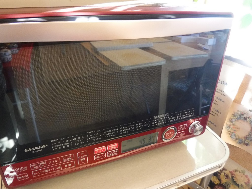 The door of microwave oven is misted due to high humidity inside.