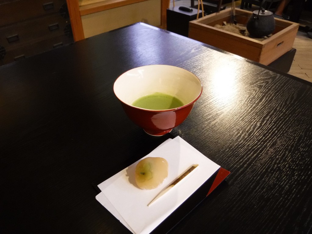 A set of matcha and “Wagashi” Japanese traditional confection, with seeing Japanese traditional antiques, such as Tetsubin, Irori and Hibachi.